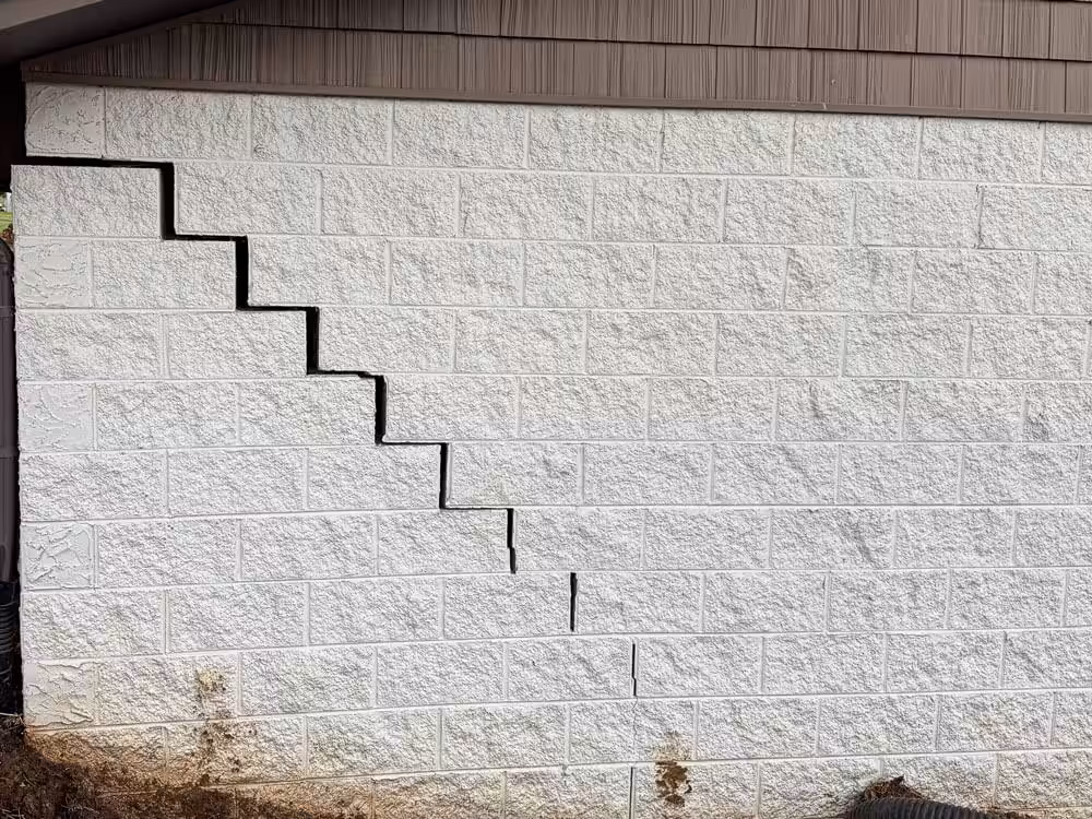 Stair step cracks in a building's foundation