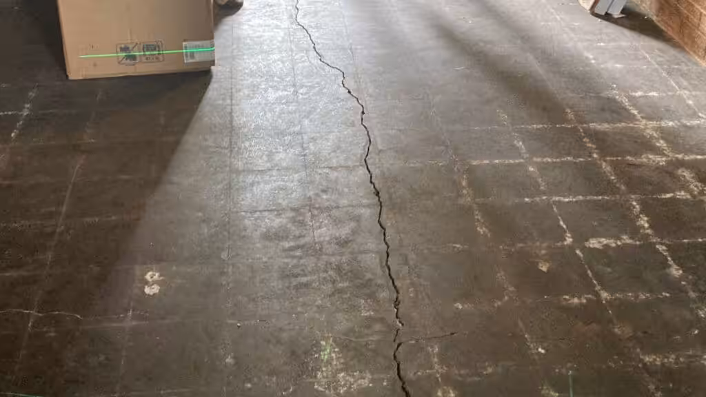 Cracked subfloor from water damage