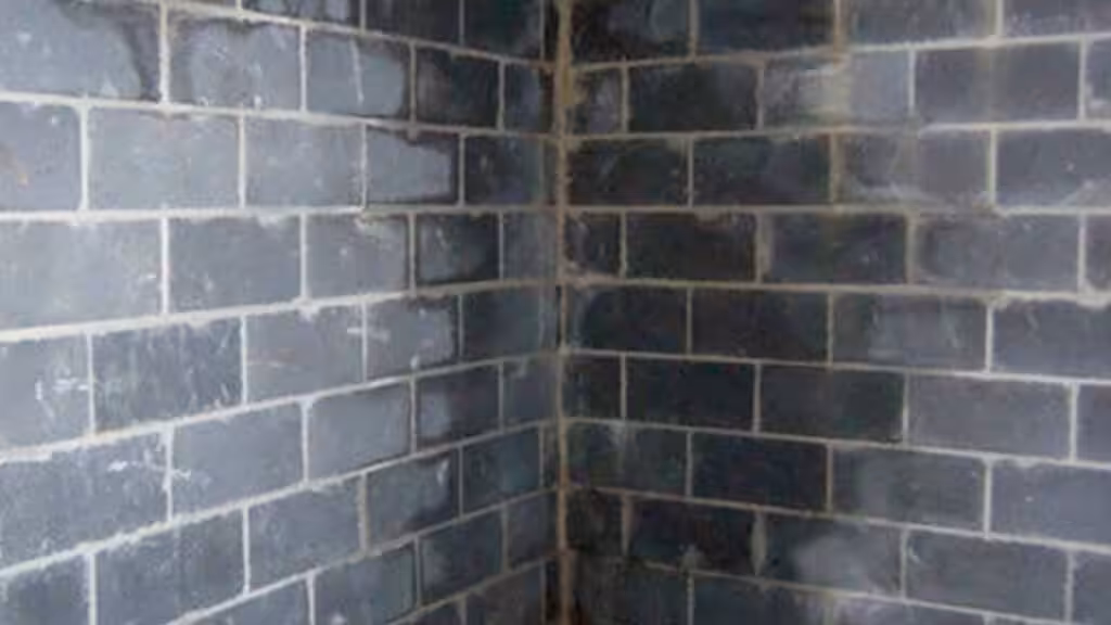Basement wall showing signs of water staining
