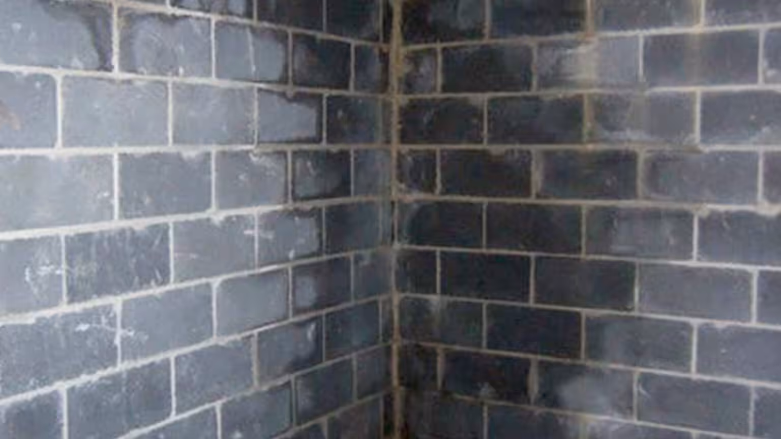 Basement wall showing signs of water staining