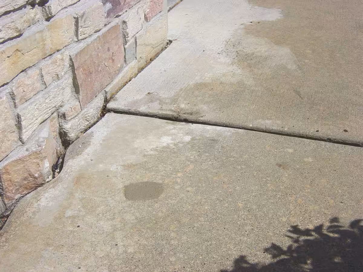 Leveled sidewalk next to home after concrete leveling