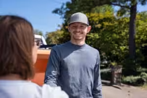 Foundation and Waterproofing Specialist shaking hands with homeowner in Kenosha