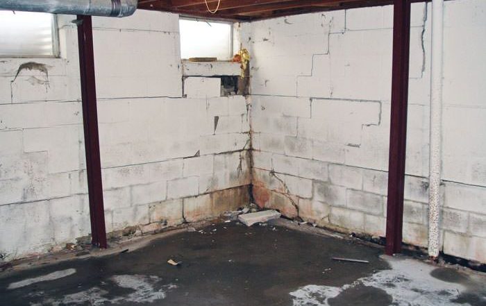 Rusty I-beam foundation in need of repair